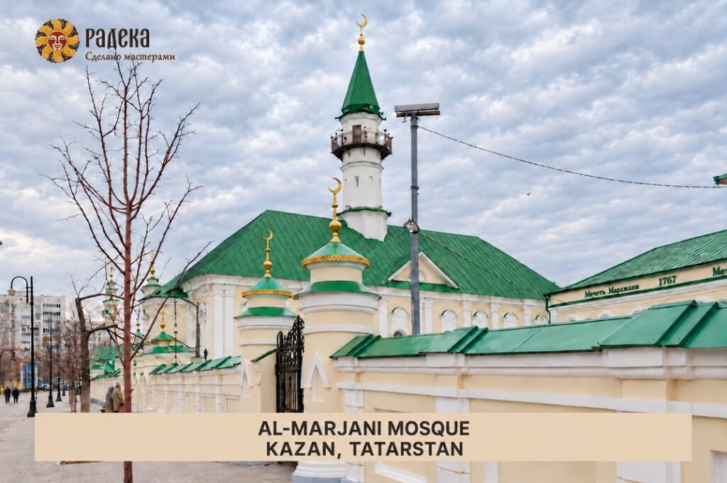 Al-Marjani Mosque in Kazan, with a minaret rising above the green roof of the stone building.